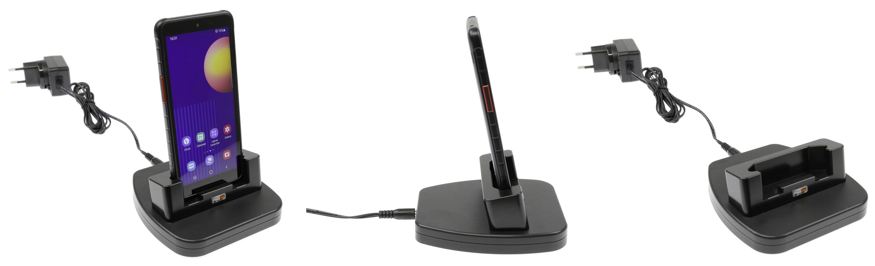 'Smartphone docking station with power supply. Left: Smartphone in dock with display facing forward. Centre: Side view. Right: Empty dock.'