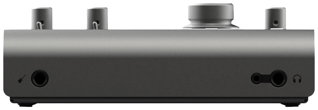 A grey audio device with multiple connections and a rotary dial on the top, designed for connecting audio accessories.