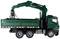 Lorry with green crane arm and open cargo area, suitable for heavy loads. Six wheels, industrial usage.
