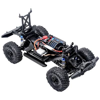 'Model of a remote-controlled car without bodywork, showing electronics, motor and chassis on a large, robust frame.'
