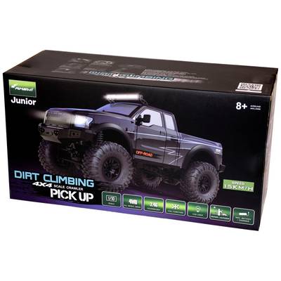 'RC Truck Packaging: Image of a remote-controlled off-road vehicle on a black cardboard box. Details: 4WD, 2.4 GHz, Speed 15 km/h.'