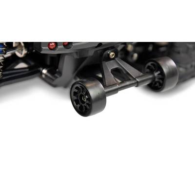 Close-up of a toy car showing the rear axle with two black wheels and a black mounting bracket against a white background.