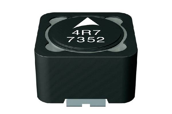 A black electronic component with the inscription '4R7 7352' and an upward-pointing arrow. It appears to be an inductor.