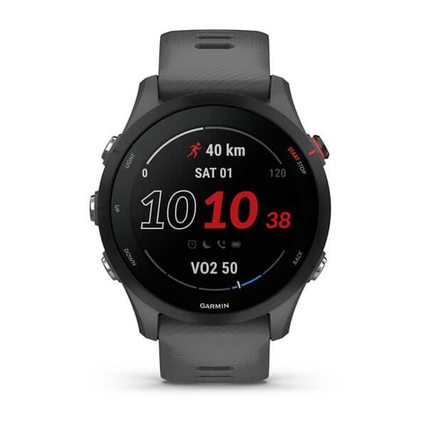 A black sports watch displays a training screen: 40 km run, date 'Sat 01', heart rate, VO2 measurement, time 10:38.
