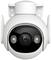 Security camera in white mounting bracket, with round lens and side lights, wall-mounted.