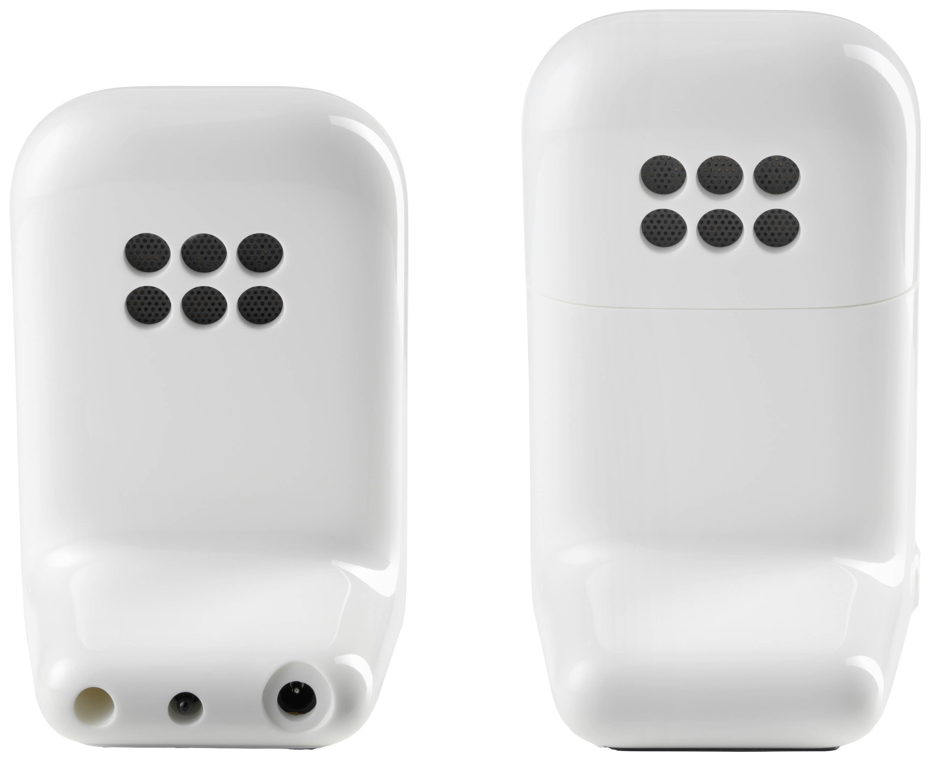 Two white devices with a black dot pattern on the front; one has ports at the bottom, the other does not.