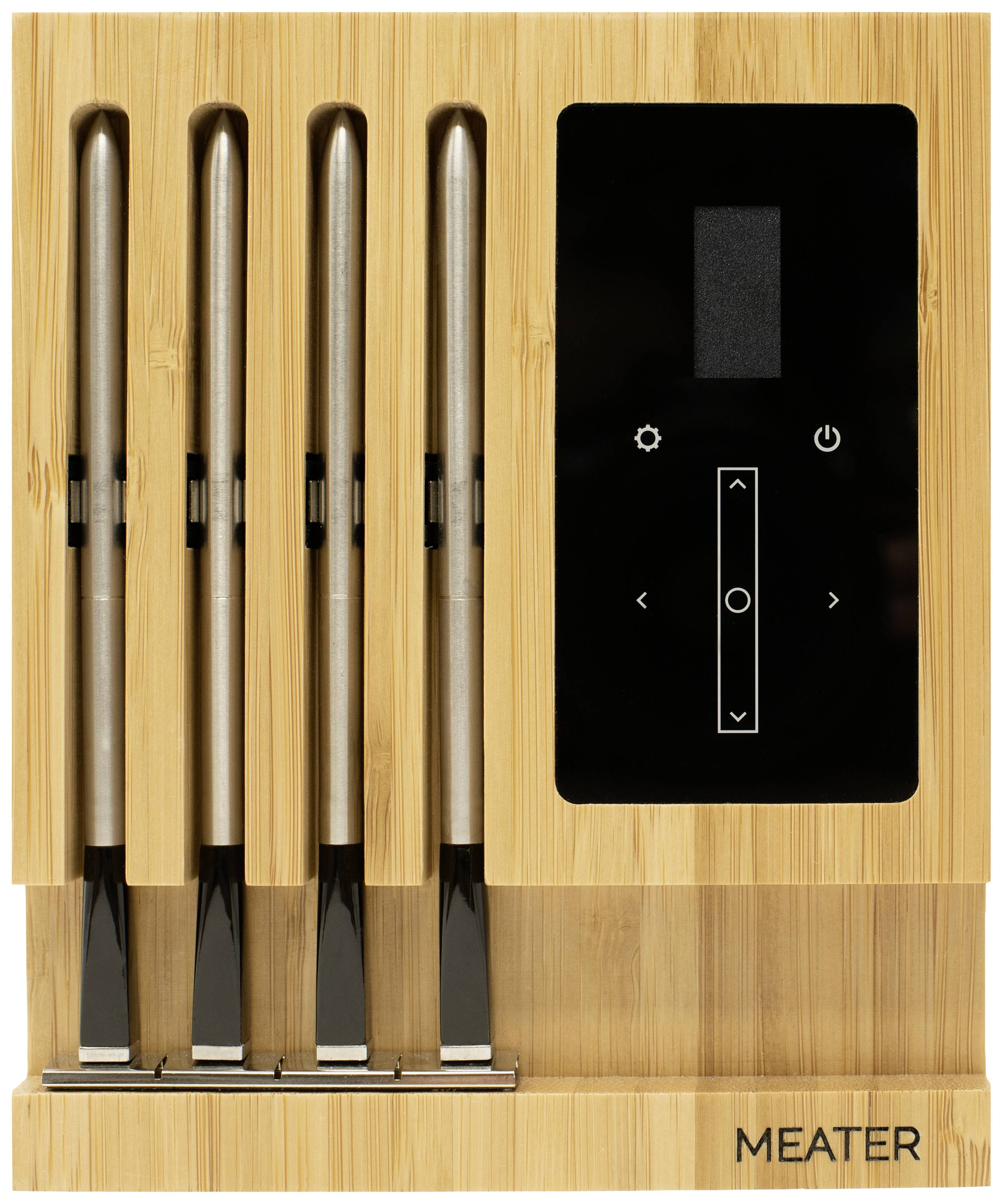 A wooden holder with four stainless steel thermometers and a digital display for temperature monitoring.