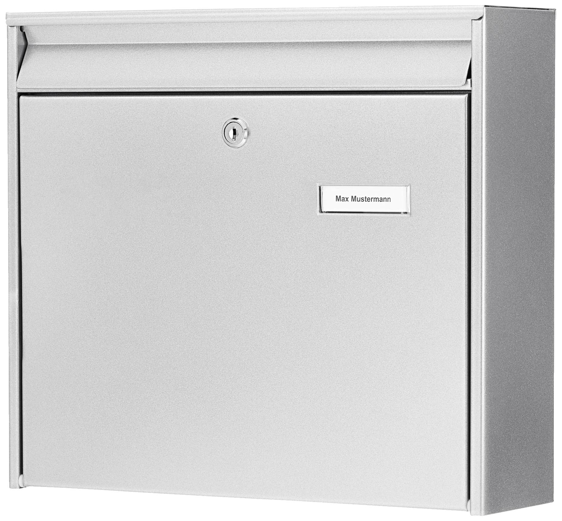 A silver metal letterbox with a name plate reading 'Max Mustermann'.
