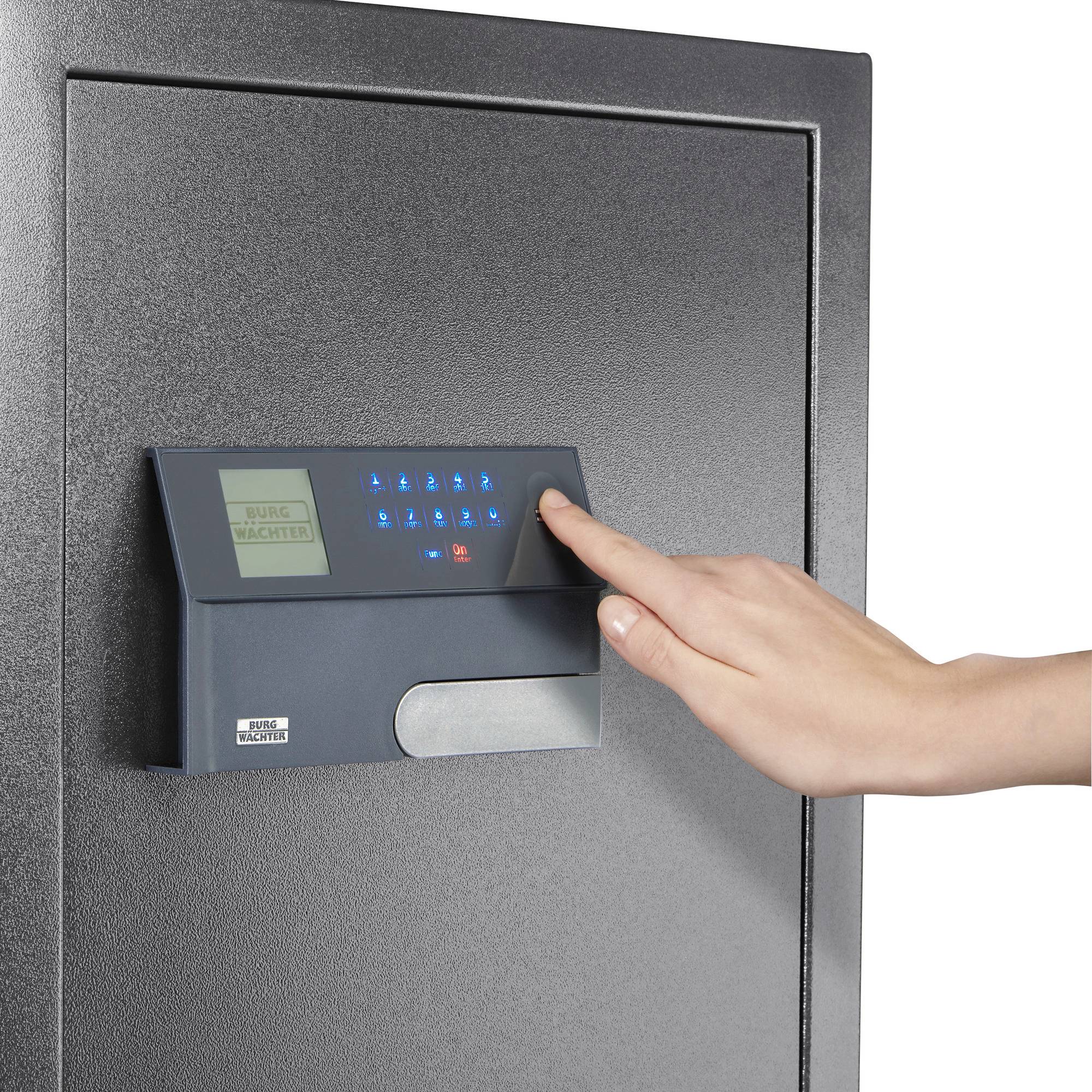 A hand is entering a code on a digital safe. The safe has a control panel with blue buttons and a small screen.