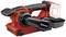 A red, cordless belt sander without a battery, with an ergonomic handle and removable dust container, side view.