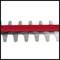 Close-up of a hedge trimmer blade with a red protective strip along the cutting teeth.
