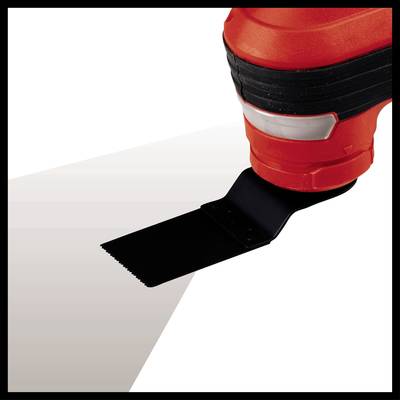A red electric tool with a saw blade, used for cutting material. Ideal for precise work.