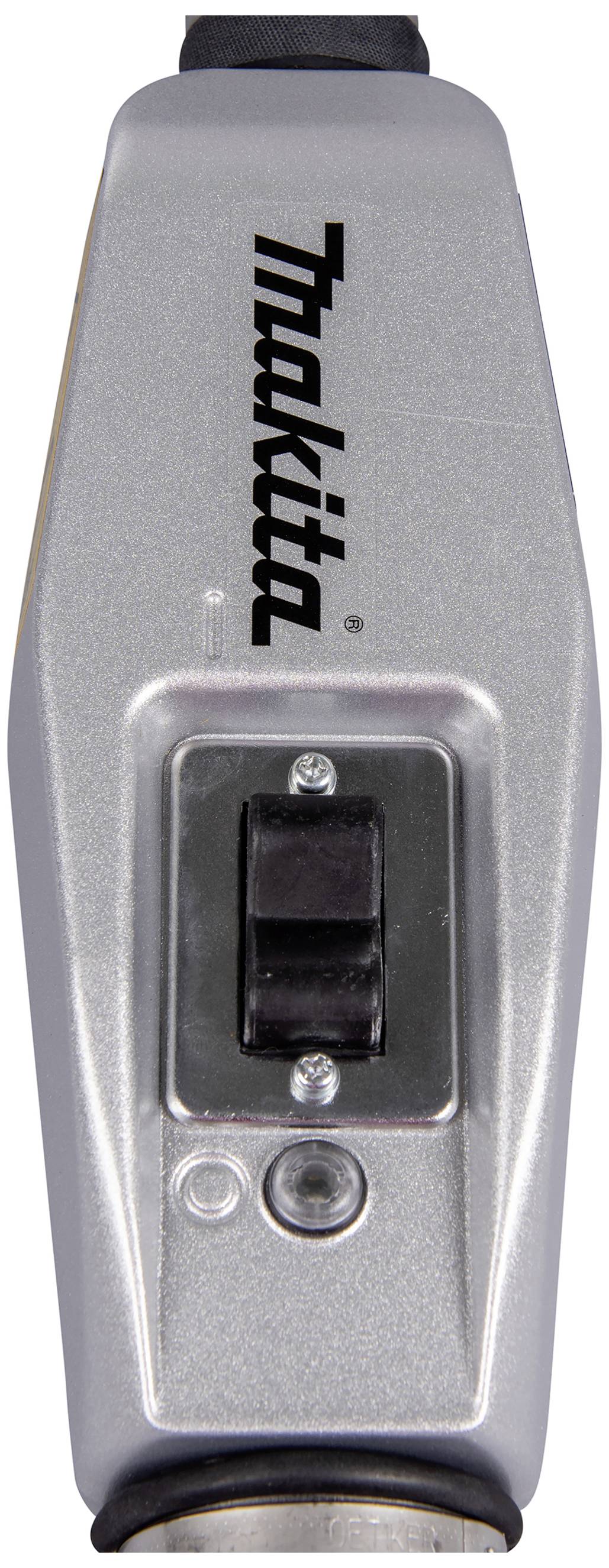 Silver electrical power tool with a black switch and 'Makita' logo printed on the front.