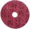 A red, round cleaning pad with a rough texture and a hole in the centre for floor cleaning.