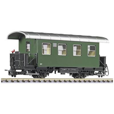 Green model railway passenger carriage with a curved roof and four windows, placed on rails.