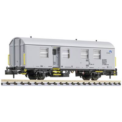 Grey painted railway carriage with RWE logo, sitting on railway tracks. The carriage has windows and doors, with yellow details on the ladder.