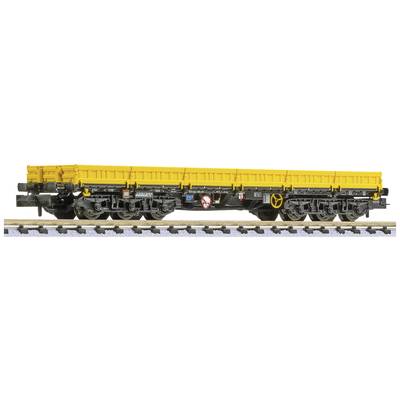 Yellow goods wagon on railway tracks, side view, with black details and multiple axles, suitable for transporting cargo.