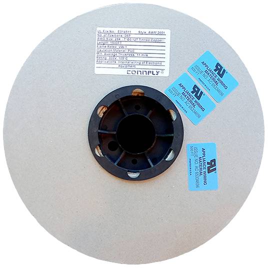 A large, round reel with blue labels and a central plastic holder. The labels contain technical information.