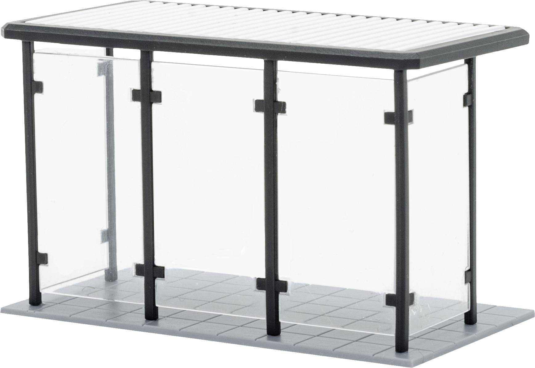 A small waiting area with glass walls and a flat roof, suitable for a bus stop or shelter.