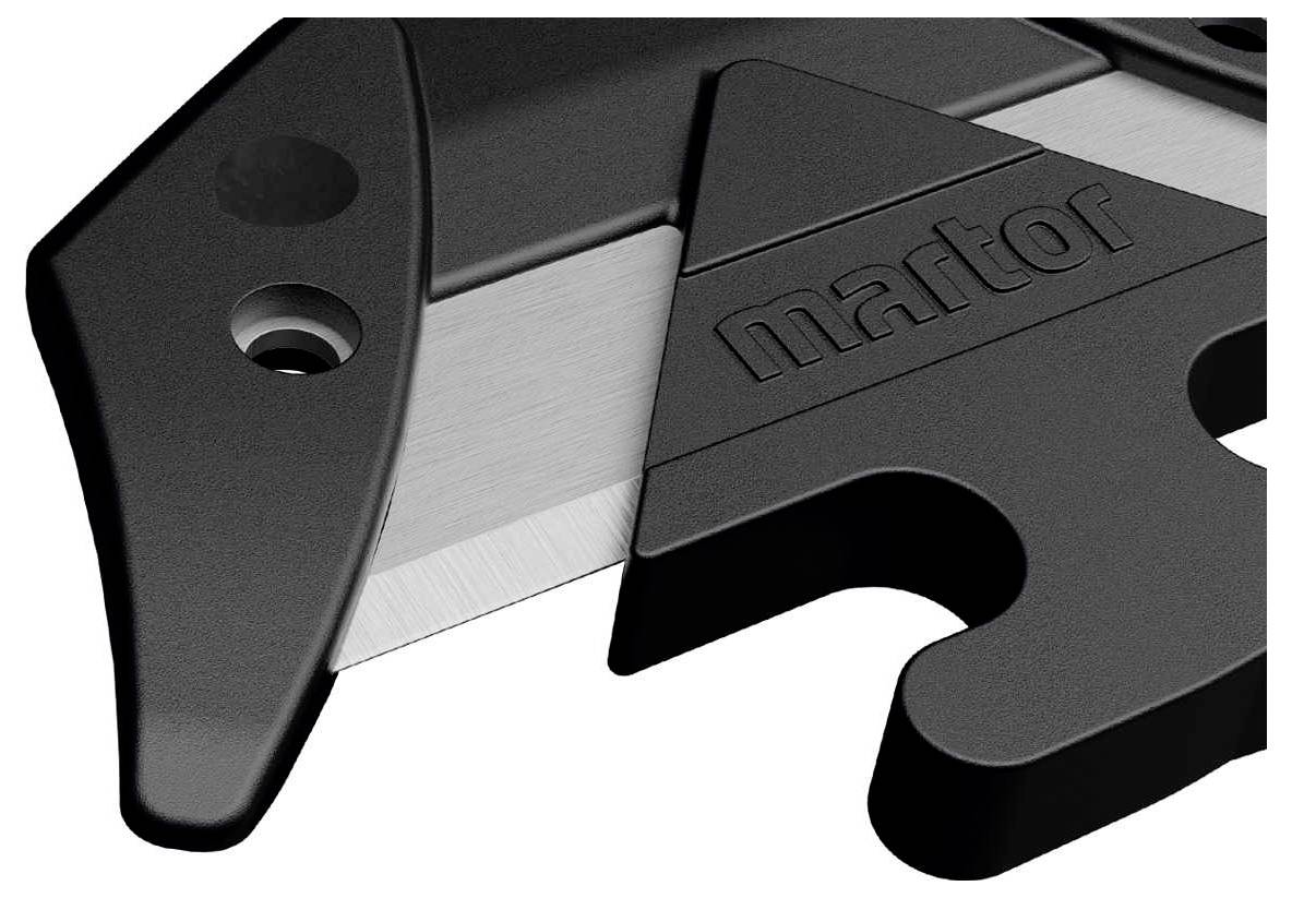 Close-up of a black safety knife with visible blade and the word 'martor' embossed on the casing.