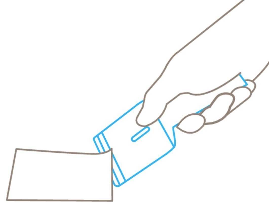 Drawing of a hand inserting a card into a card reader.