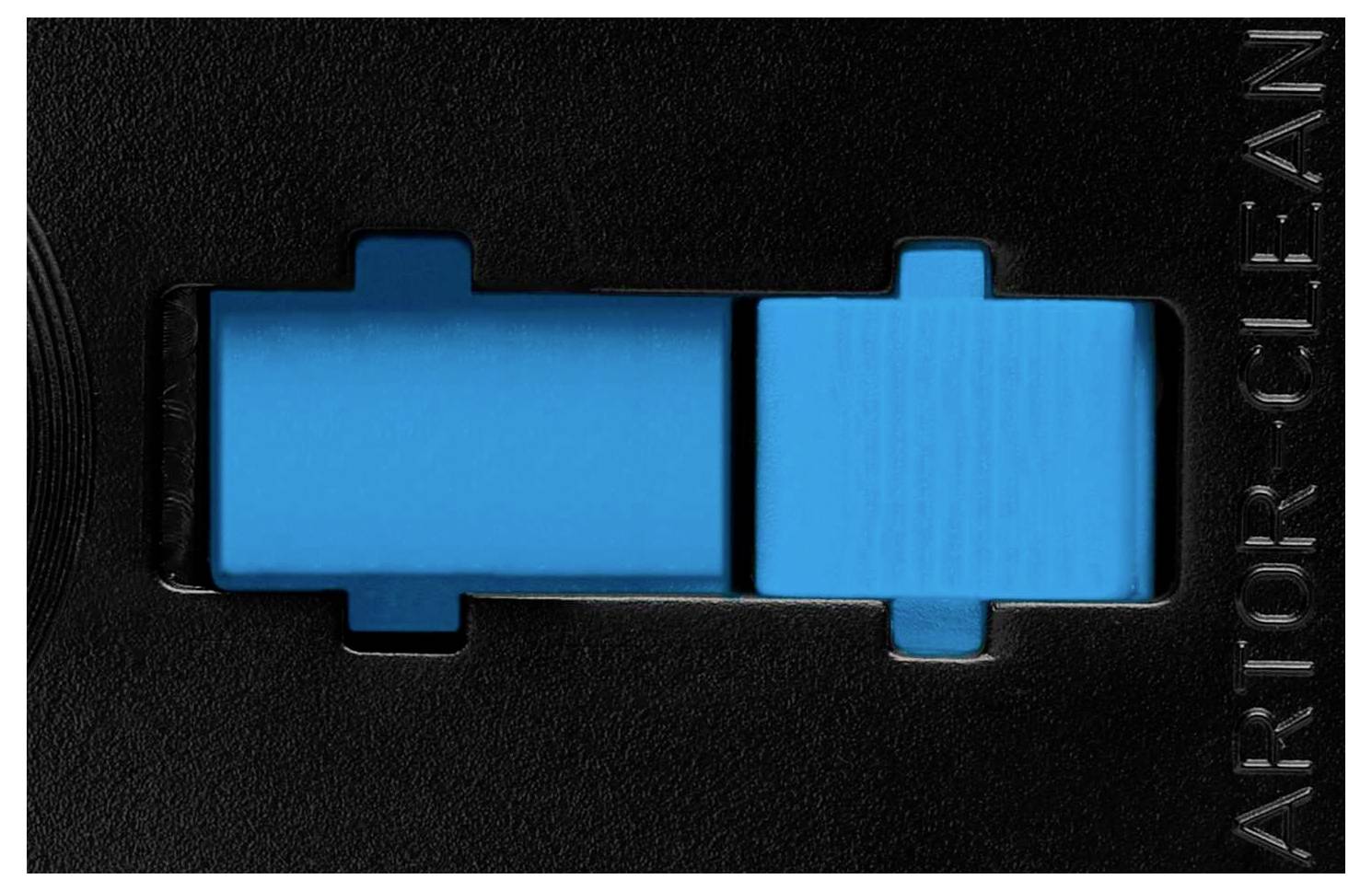 A black switch with blue elements. Text 'ART OR CLEAN' to the right beside it.<br><br>Note: This looks like a direct translation to British English, preserving the original description's structure and wording.