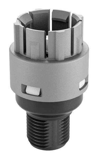 A silver, cylindrical metal component with a serrated top surface and threaded base, possibly a machine part.