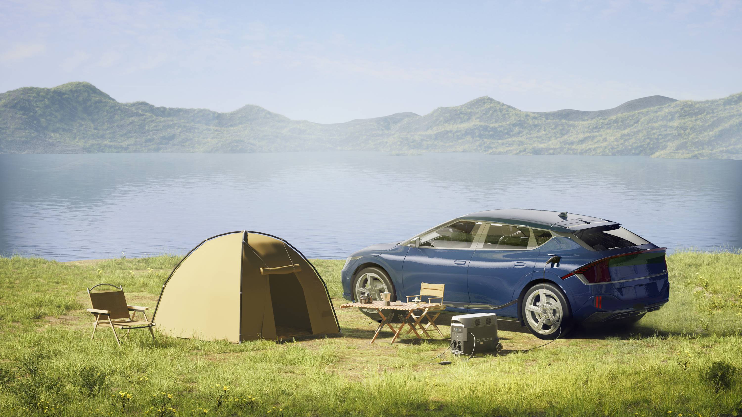 A blue car is parked next to an erected tent by the shore of a lake, surrounded by a table and folding chairs on a meadow.