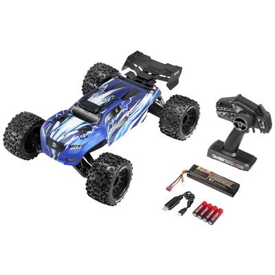 Blue remote-controlled car with large tyres, remote control, rechargeable battery, charger, and batteries. Ideal for outdoor racing.