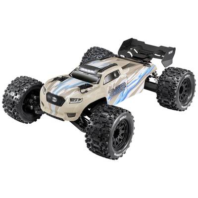 A remote-controlled off-road style car with chunky tyres and a beige and blue design. It features the lettering 'Thor'.