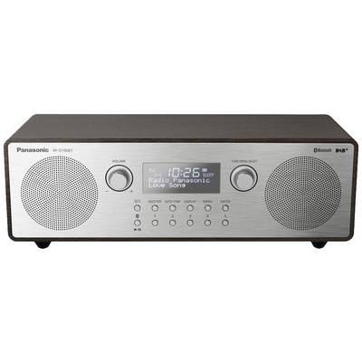 Panasonic radio alarm clock with digital display showing '10:26 AM Radio Panasonic Love Song'. Silver front panel with two speaker grilles.