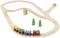 Wooden train set with tracks in a loop, three colourful carriages, and two green pine trees.
