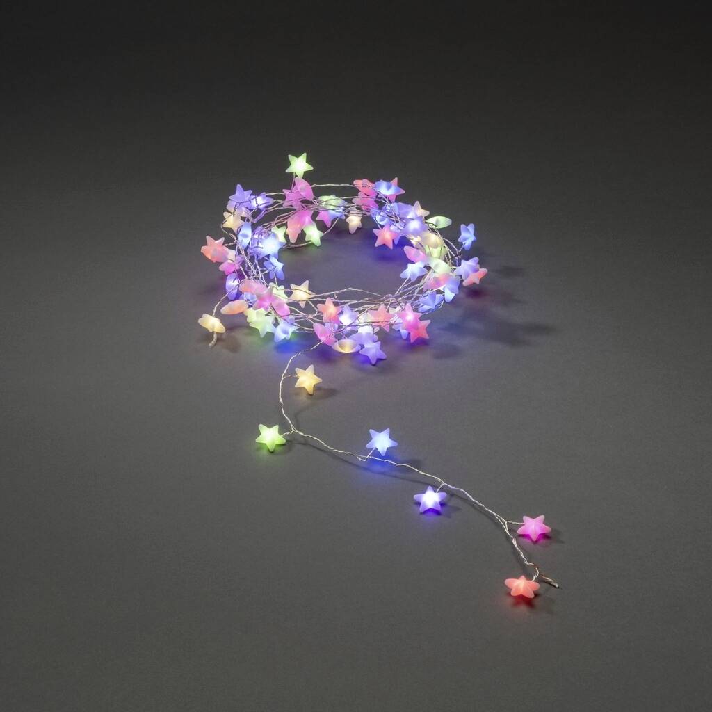 String of fairy lights with star-shaped, colourful bulbs that create a festive atmosphere.