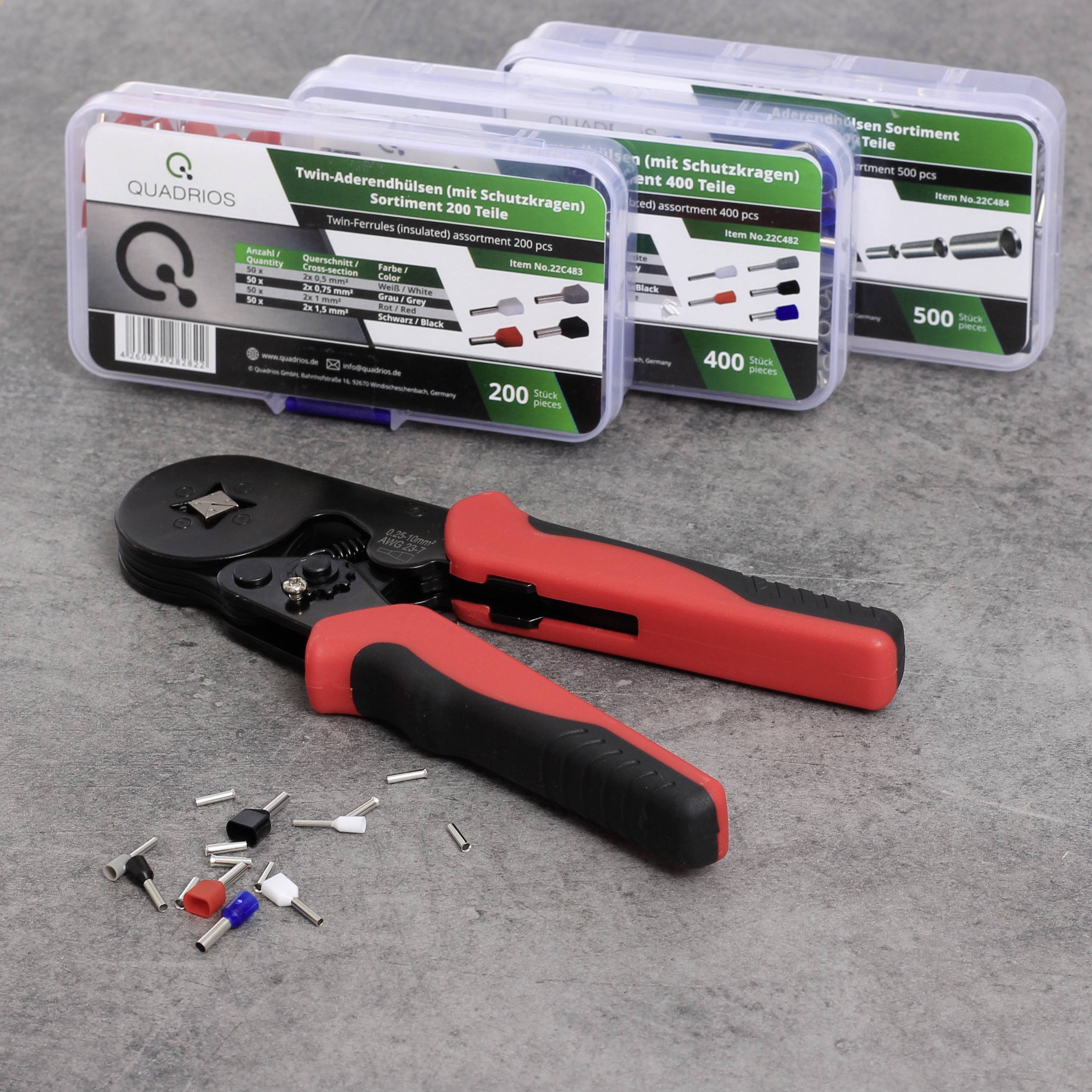 Crimping pliers and accessories on a grey background. Three assortment boxes with various crimp sleeves, arranged by size and colour.