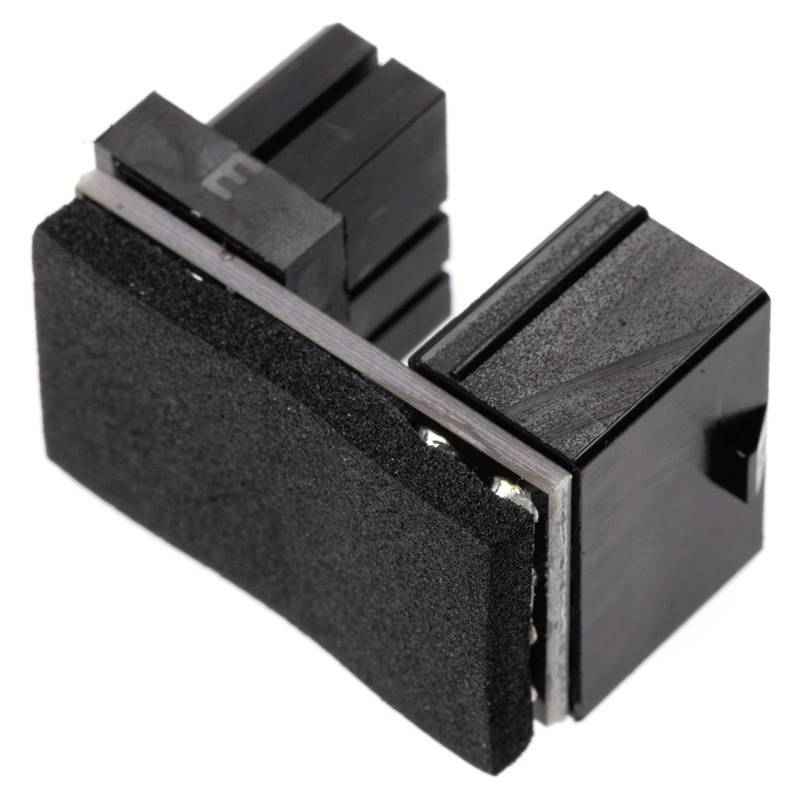 Black, rectangular plastic component with side foam padding and plug connections. Likely used in electronic devices.
