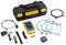 A network testing device set with a main unit, cables, adapters, and a carry case. Used for testing network cables.