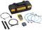 A cable tester kit with a carry case, cables, connectors, and a yellow handheld device for network analysis.
