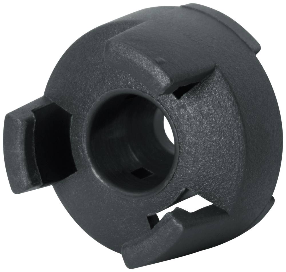 A black, circular plastic component with three cut-outs evenly distributed around its circumference.