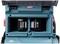 Battery charger with two Makita batteries in an open charging bay. 'XGT' is written on top. The device appears robust and industrial.