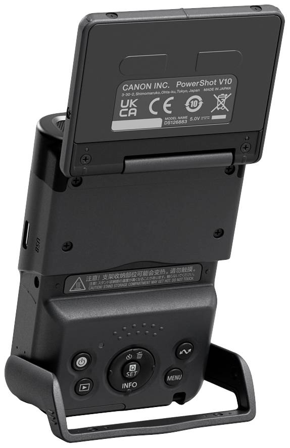 A camera with a flip-out screen shows the rear panel with buttons for settings and menus, mounted on an extendable stand.