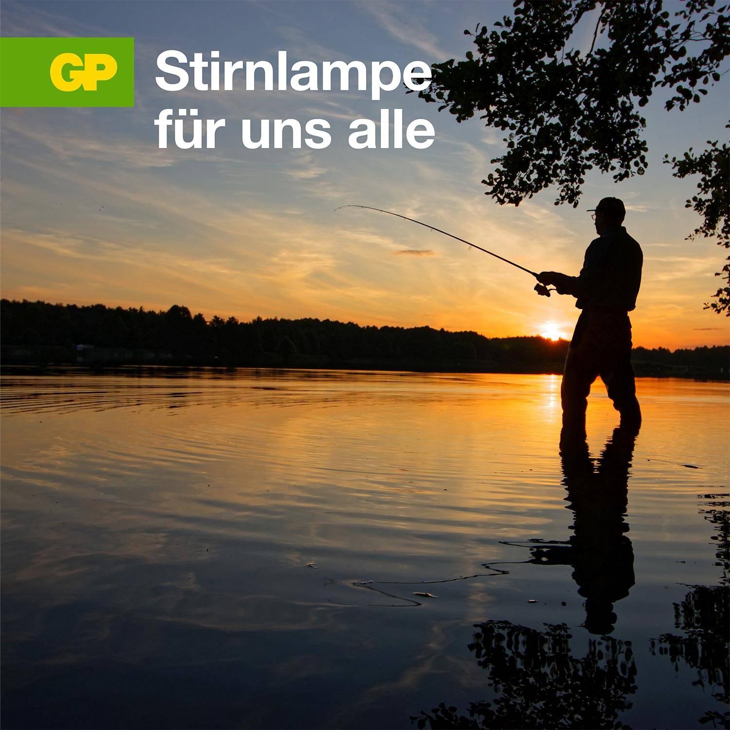A person fishes at sunset by a tranquil lake, their silhouette reflected in the water. Text: 'Headtorch for us all'.