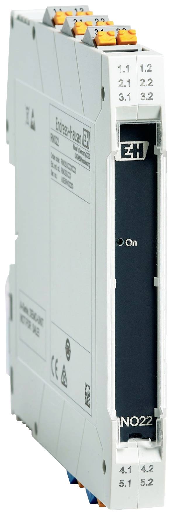 A grey electrical module with connectors and labels. Contains internal circuitry and is used for control purposes.