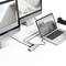 A laptop is connected to two large monitors via a docking station hub, displaying different images.