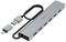 A silver USB hub with six blue USB ports and an attached cable that has different USB plugs on both ends.