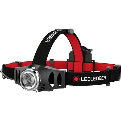 Head torch with black and red band. 'LEDLENSER' brand name visible on headband. Lighting device for hands-free use.