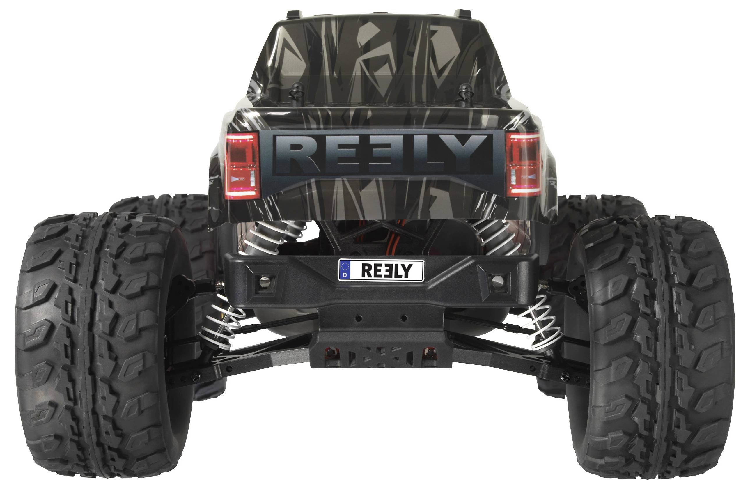 A remote-controlled car in black design with large off-road tyres, viewed from behind, bears the 'REELY' logo.
