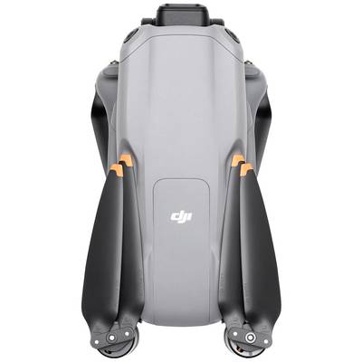 Folded drone with a grey casing, black propellers, and orange markings. Brand logo visible in the centre of the device.