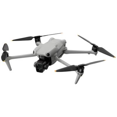 Grey drone with four rotors in flight position, camera module at the front, suitable for aerial photography and reconnaissance.