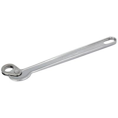 A silver spanner with a rounded end and long handle lies at an angle; a tool for tightening nuts.