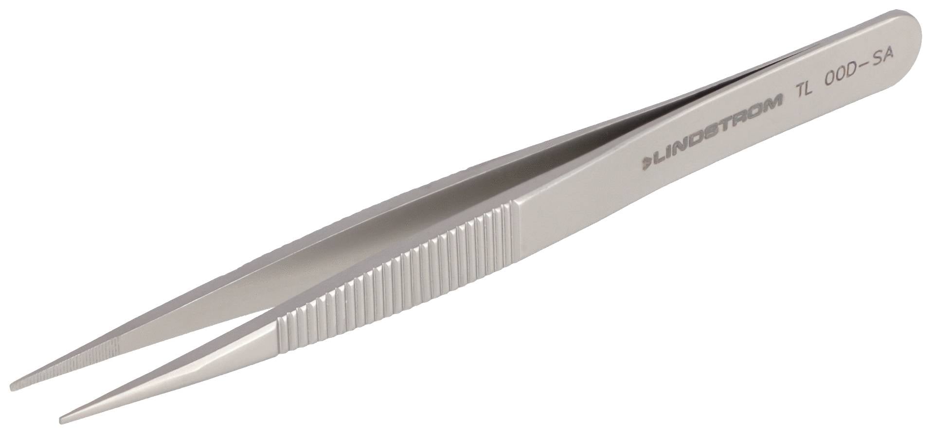 A silver, metallic pair of tweezers with a textured handle lies on a white surface.